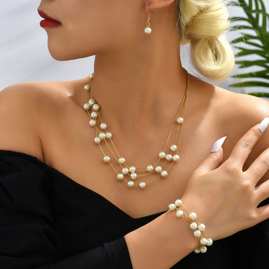 Elegant Pearl Necklace Earrings Bracelet Set