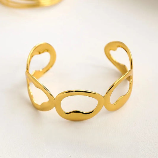 Elegant abstract cut-out cuff bracelet